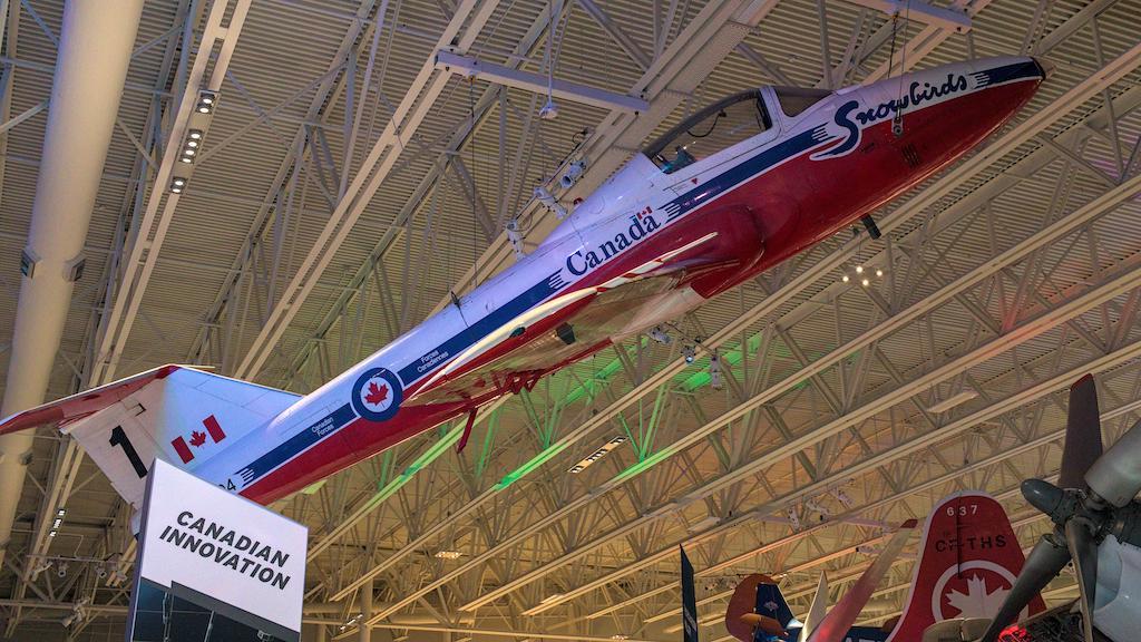 CL-114 Tutor suspended at an angle from the ceiling of the Royal Aviation Museum appears to be taking off