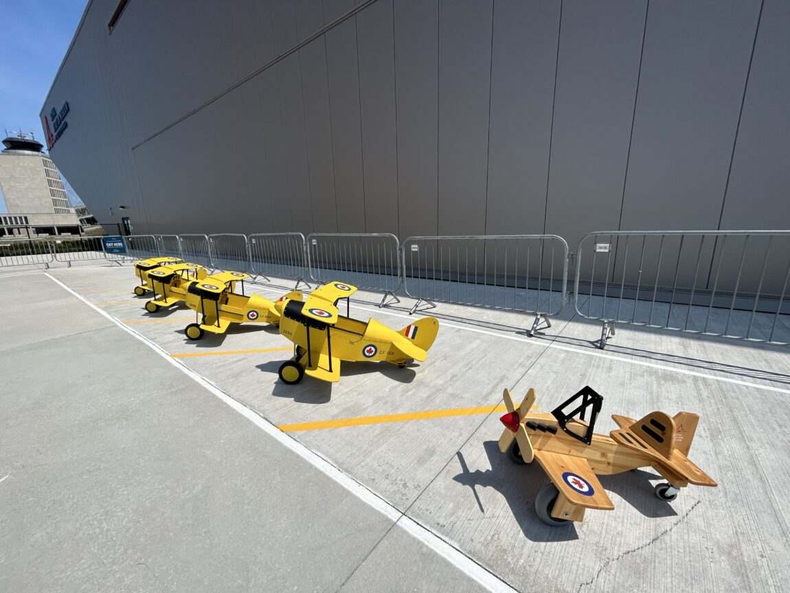 Lineup of pedal planes outside the Royal Aviation Museum of Western Canada
