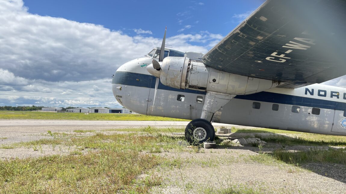 Front end of Bristol Freighter CF-WAE on tarmac of Keewatin Air.