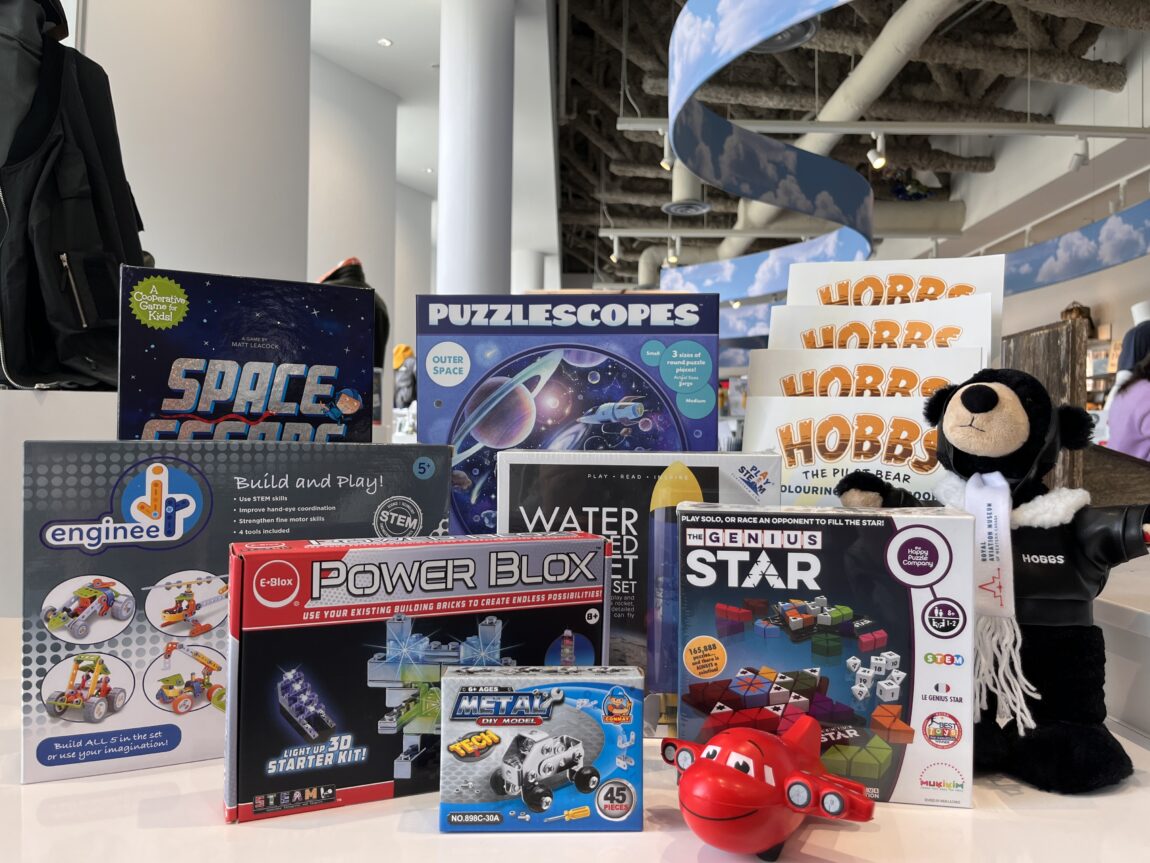 Arrangement of assorted children's aviation and space themed toys and games from the Landing Zone Boutique at the Royal Aviation Museum of Western Canada