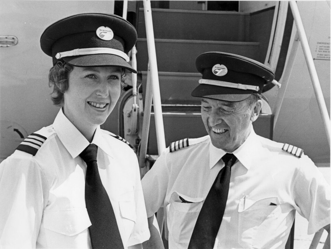 black and white photo of female and male pilots