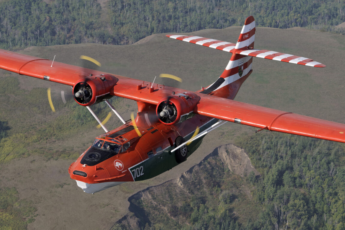 Canso aircraft in flight; air-to-air perspective
